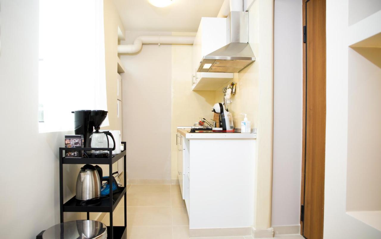 Praxitelis Luxury Apartments เอเธนส์ ภายนอก รูปภาพ